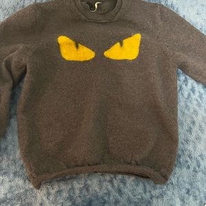 Fendi sweater it’s authentic (shrink it and now it’s xs size) M